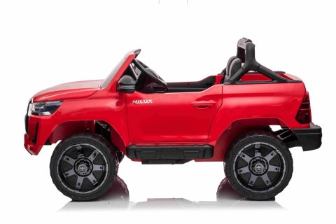 Toyota Hilux na akumulator dla dzieci Czerwony + Napęd 4x4 + Pilot + 2 bagażniki + Radio MP3 + LED Toyota Hilux na akumulator dla dzieci Czerwony + Napęd 4x4 + Pilot + 2 bagażniki + Radio MP3 + LED