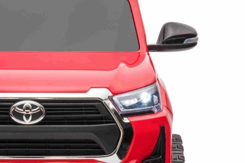 Toyota Hilux na akumulator dla dzieci Czerwony + Napęd 4x4 + Pilot + 2 bagażniki + Radio MP3 + LED Toyota Hilux na akumulator dla dzieci Czerwony + Napęd 4x4 + Pilot + 2 bagażniki + Radio MP3 + LED