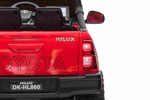 Toyota Hilux na akumulator dla dzieci Czerwony + Napęd 4x4 + Pilot + 2 bagażniki + Radio MP3 + LED Toyota Hilux na akumulator dla dzieci Czerwony + Napęd 4x4 + Pilot + 2 bagażniki + Radio MP3 + LED